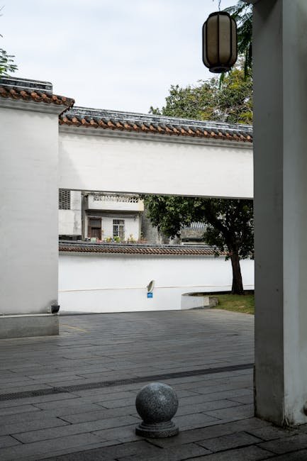 Modern Chinese courtyard estate with traditional architecture and landscaped central courtyard
