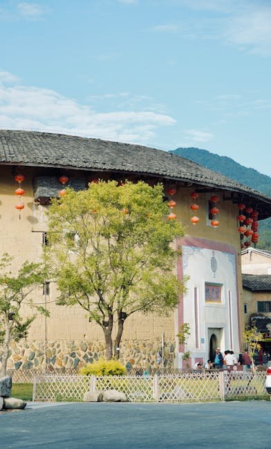 Minnan-style traditional buildings with distinctive red-brick facades and swallowtail ridges